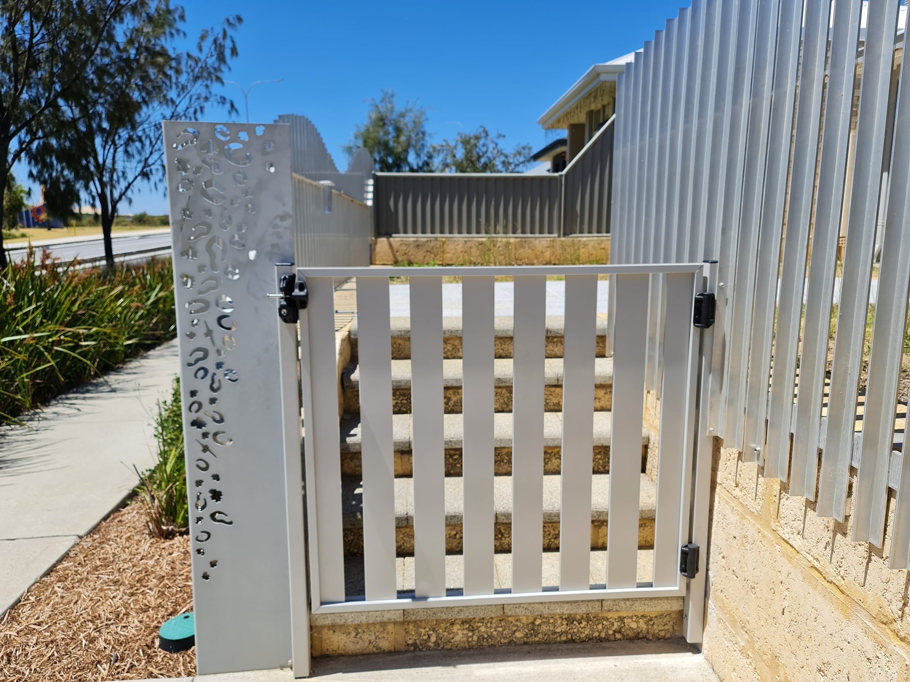 White aluminium slatted gate in Perth