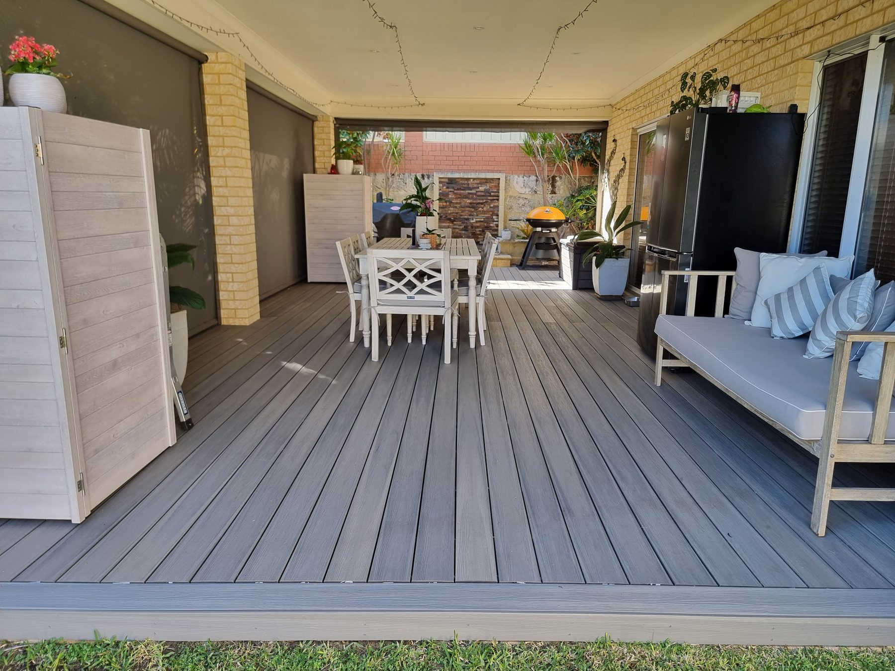 Grey composite decking on a Perth alfresco