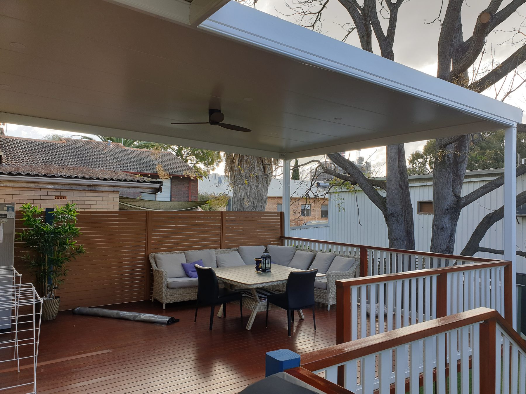 Outback Cooldek insulated roofing above an outdoor lounge and dining area in Perth
