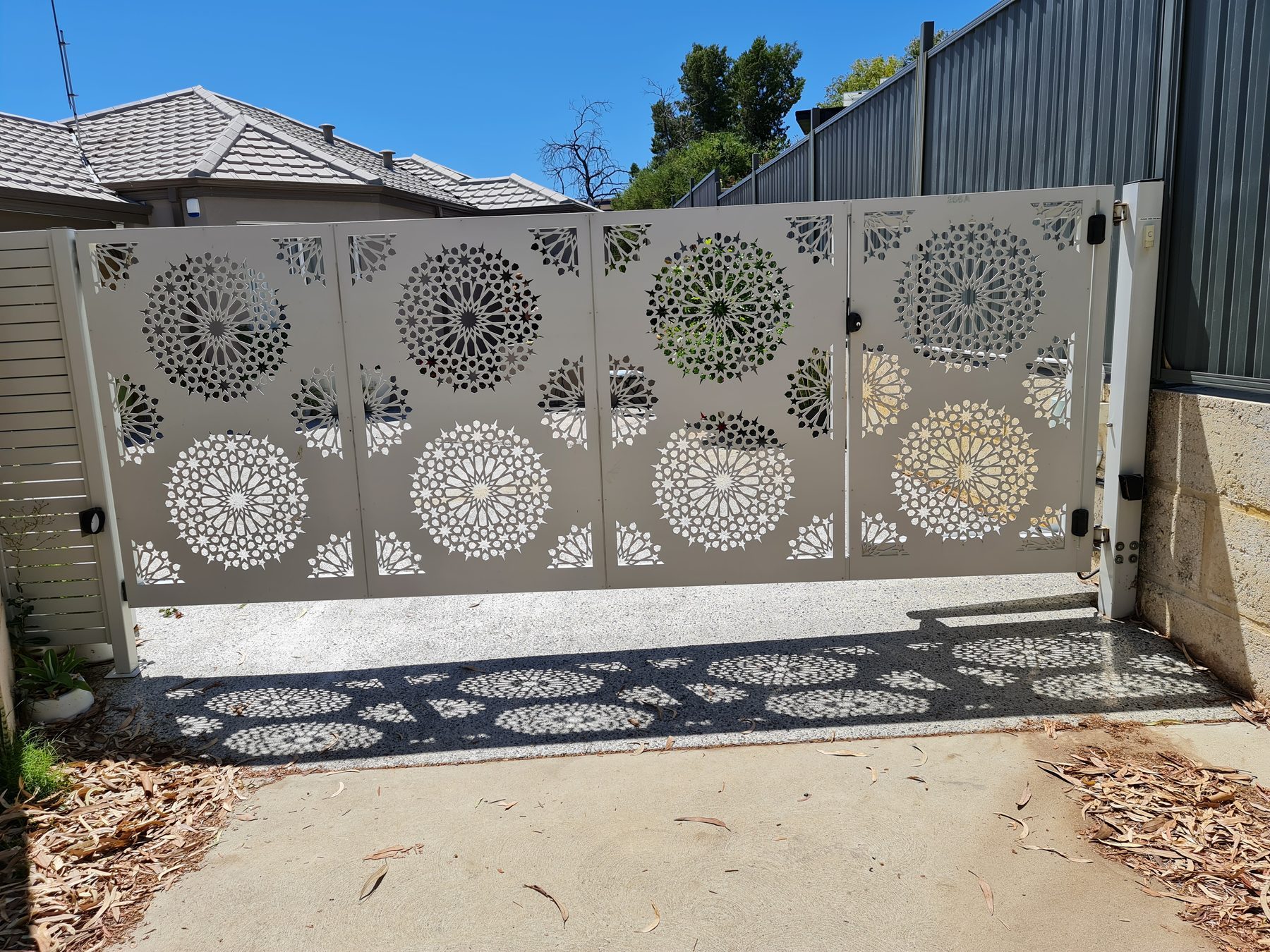 Mandala pattern laser cut gates in Perth