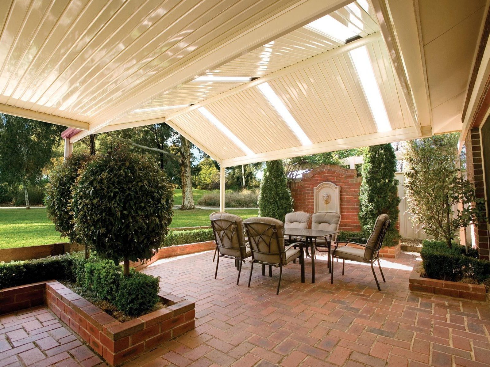 Spacious open gable patio over a paved outdoor dining area