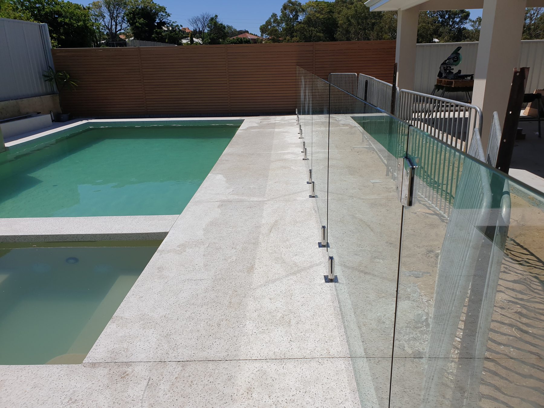 Glass pool fence surrounding a Perth lap pool